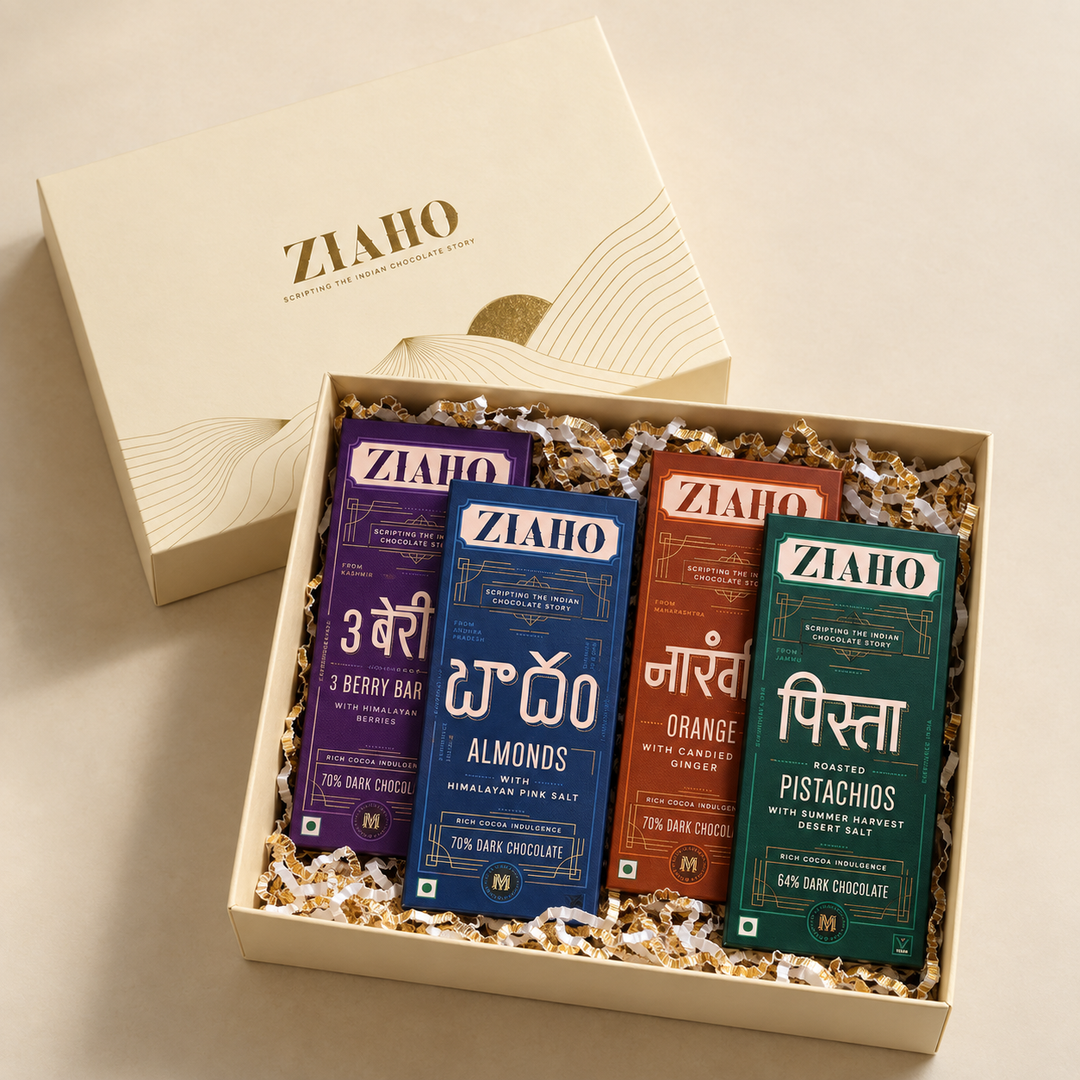 The Four: Open gift box with four dark chocolate bars